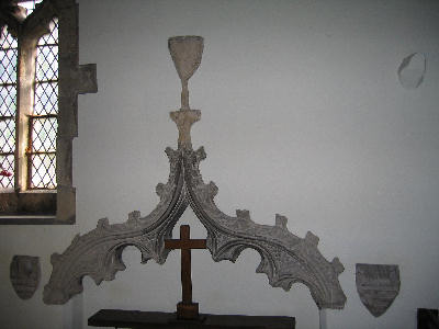 14th Century Tomb recess with arms of the Etton family